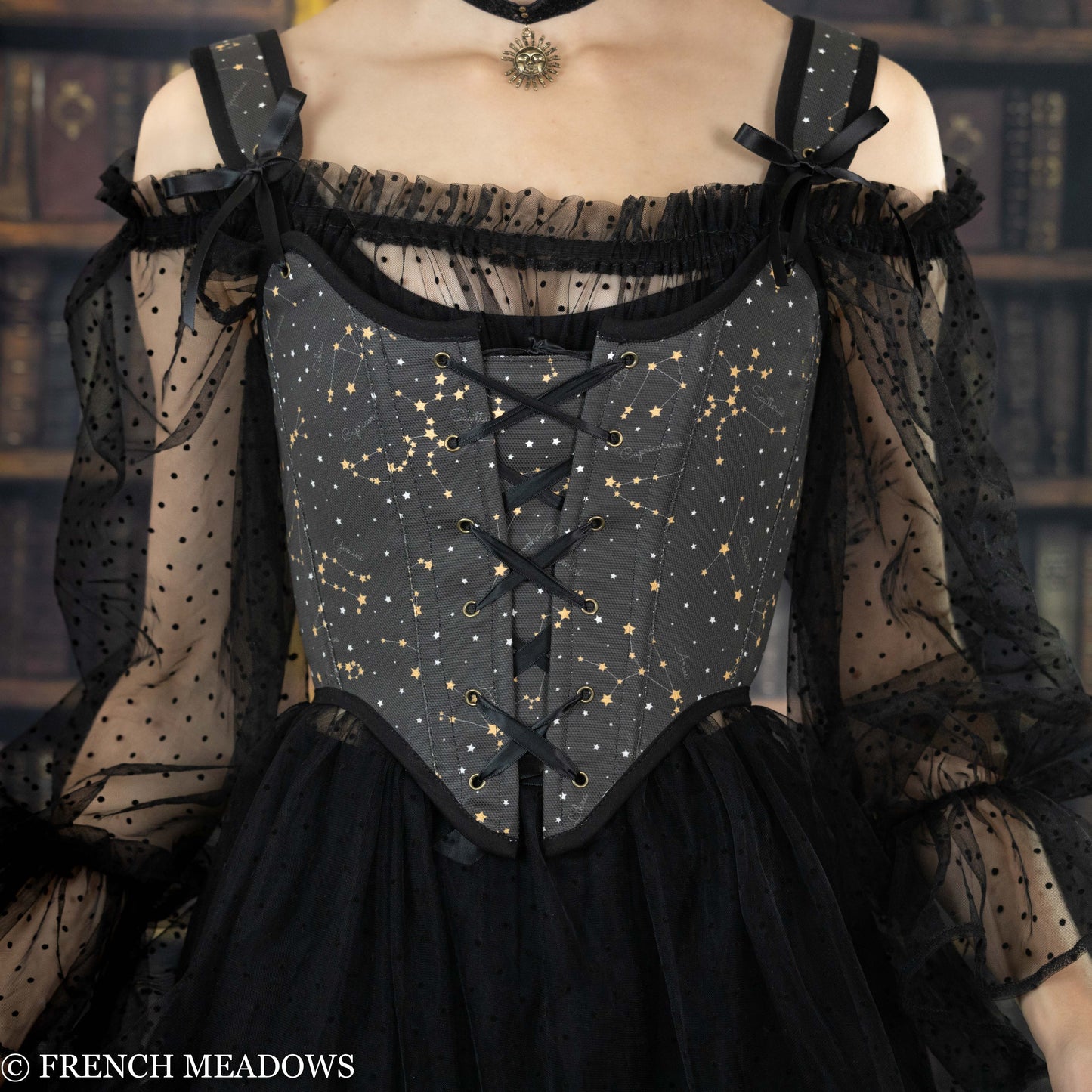 a close up view of the black corset top from french meadows