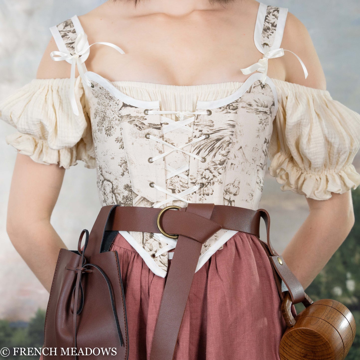 Load image into Gallery viewer, close up view of brown toile corset showing pastoral toile du jouy scene
