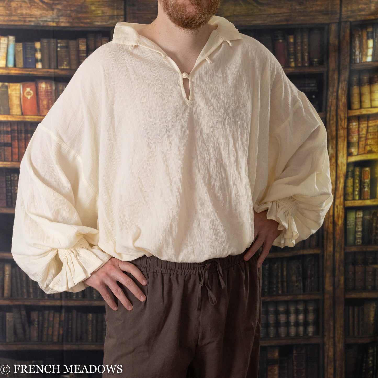 Load image into Gallery viewer, male model wearing the darcy shirt tucked into renaissance pants
