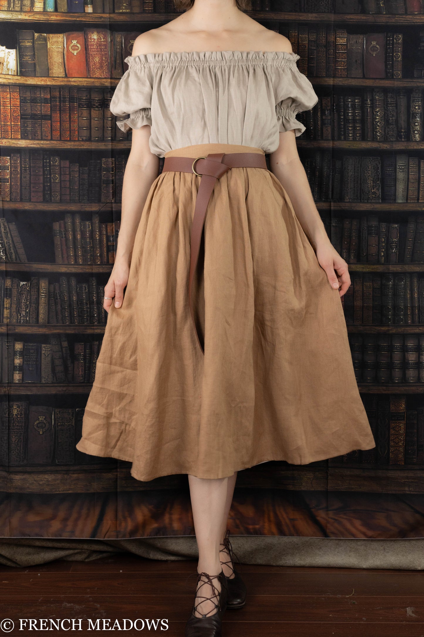 model wearing midi length brown linen skirt