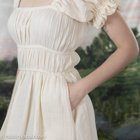 Load image into Gallery viewer, detail view of the white cotton renaissance chemise dress with pocks
