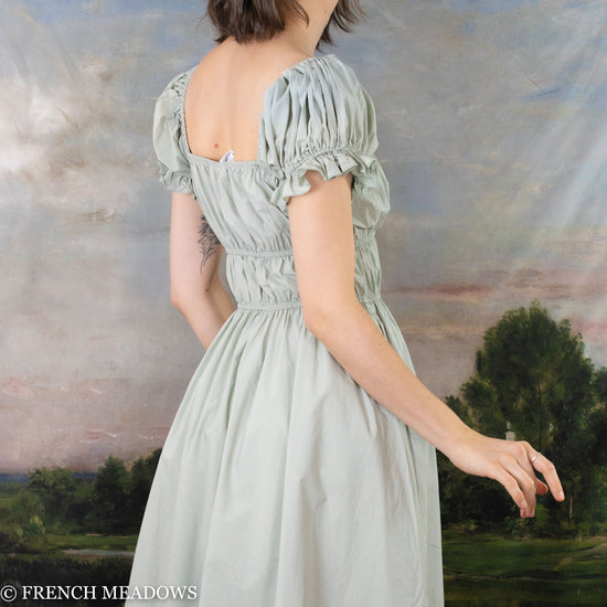 back view of sage green cotton dress